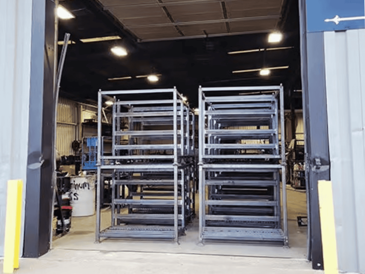 Stack racks inside warehouse facility showing organized vertical storage system